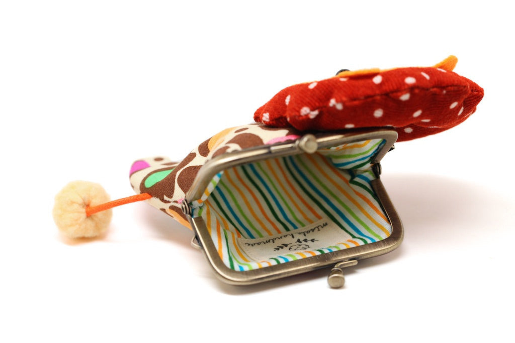 Little brown lion clutch purse in colorful leopard print